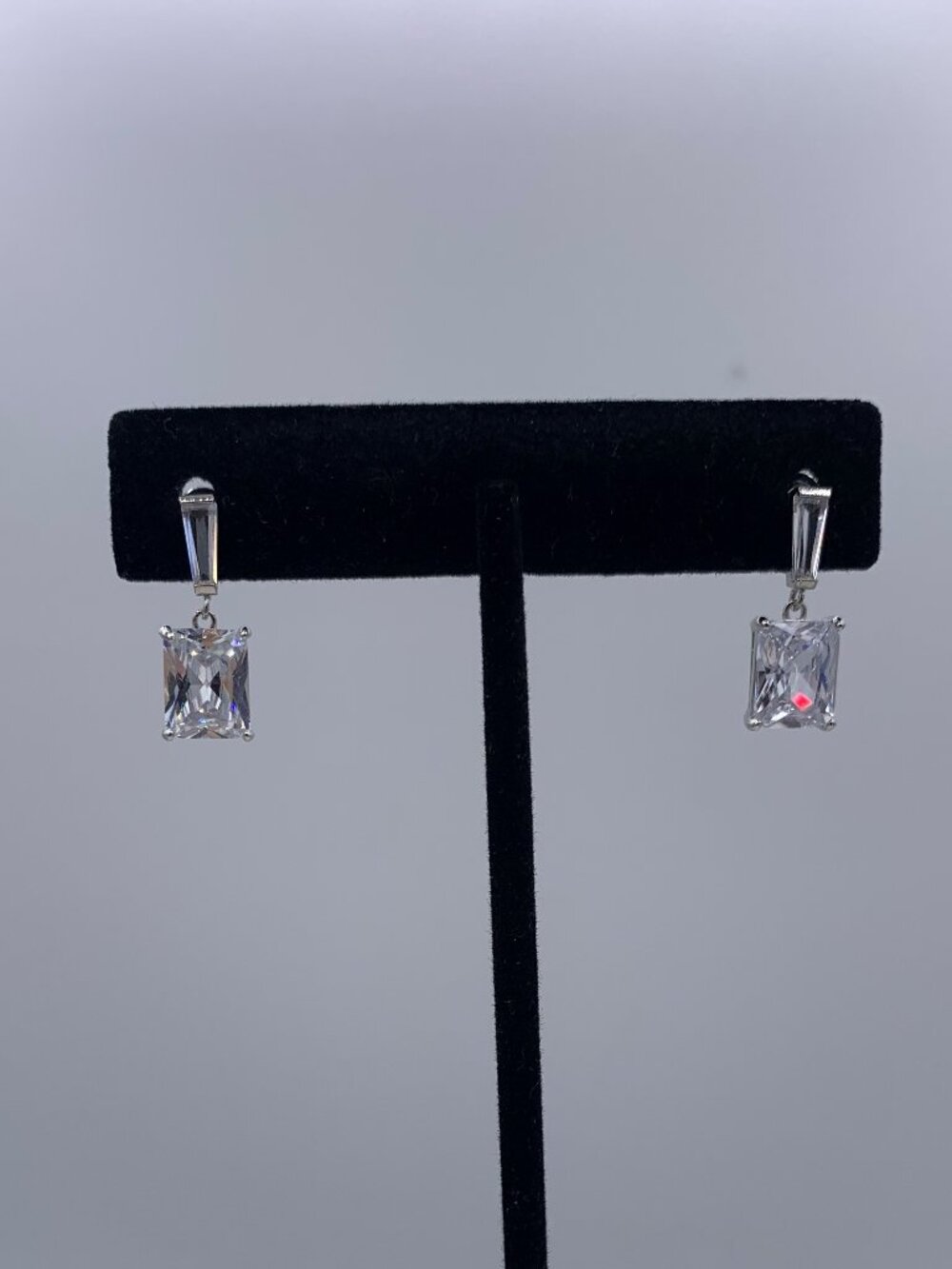 New no tags.  Earrings in solid sterling silver, lab diamond emerald cut drops.